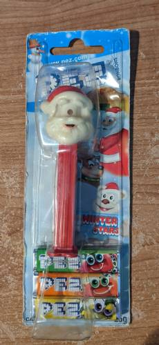 PEZ - Christmas - Santa Claus - Tan head, red hat - E