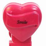 PEZ - Smile  Italic Black on Maroon on White hearts on maroon