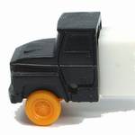 PEZ - Cab #R1 B Black Cab, Orange Wheels on white with white fender