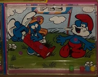 PEZ - Games and Puzzles - Smurf Ball Balance Game