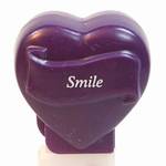 PEZ - Smile  Italic White on Dark Purple on Dark purple hearts on white