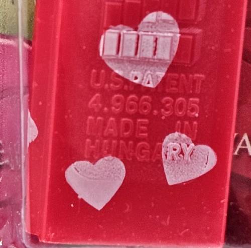 PEZ - Valentine - 2009 short - Be Mine - Nonitalic Black on Crystal Red (c) 2008