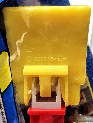 © Bryan Whalen PEZ - SpongeBob SquarePants - SpongeBob in Shirt - yellow head, front shirt, dark cheesy spots - A