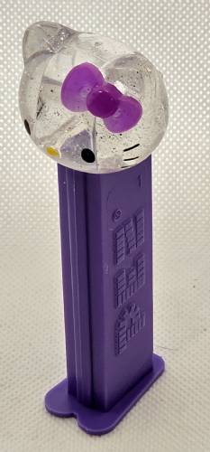 PEZ - Skulls - Glittery crystal head with purple bow