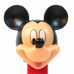 PEZ - Mickey Mouse I on mickey hand and silhouette