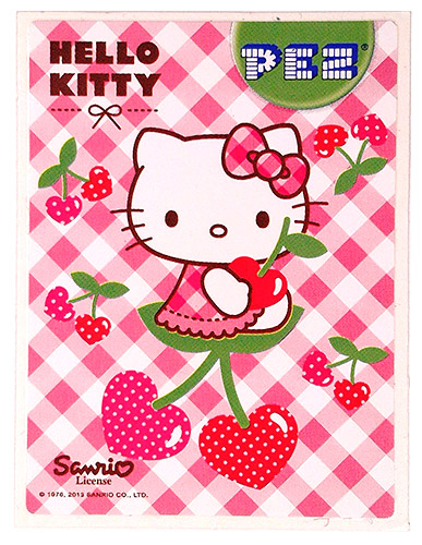 PEZ - Stickers - Hello Kitty - 2013 - Sitting on 2 cherries