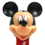 PEZ - Mickey Mouse I on mickey hand and silhouette