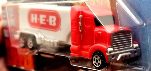 PEZ - Advertising H-E-B - Truck - Red cab, white truck - logo