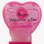 PEZ - Happy Valentine's Day  Nonitalic Black on Cloudy Crystal Pink (c) 2008 on White hearts on short hot pink