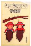 PEZ - Boy & girl on tree limb  